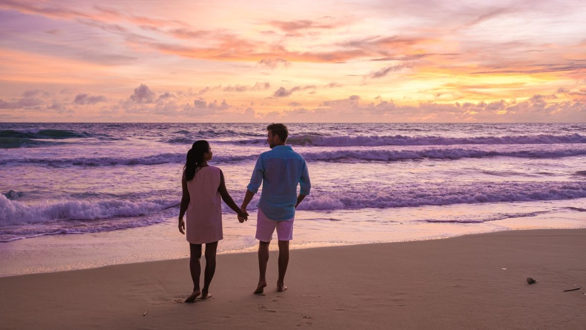 couple on beach at sunset